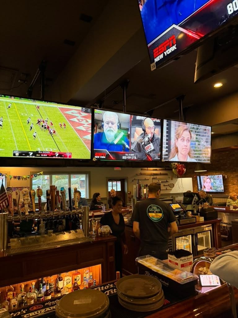 A full bar at The Chapter House under the screens