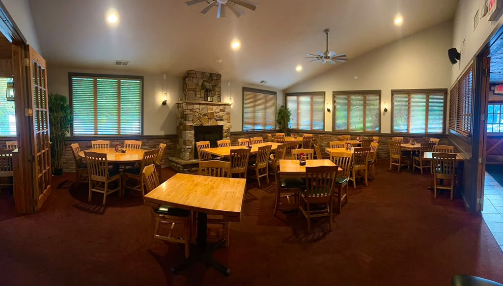 The wide private dining room set for a party at The Chapter House